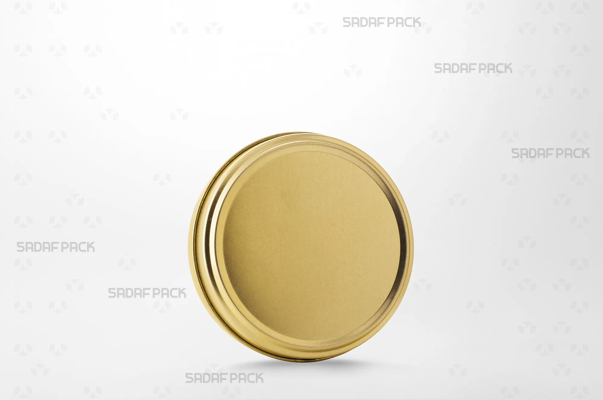 A three-quarter angle view of the Sadaf Pack 10 Metal 2 cm Tin without Window (300 Metal), showing its circular shape and solid metal lid.