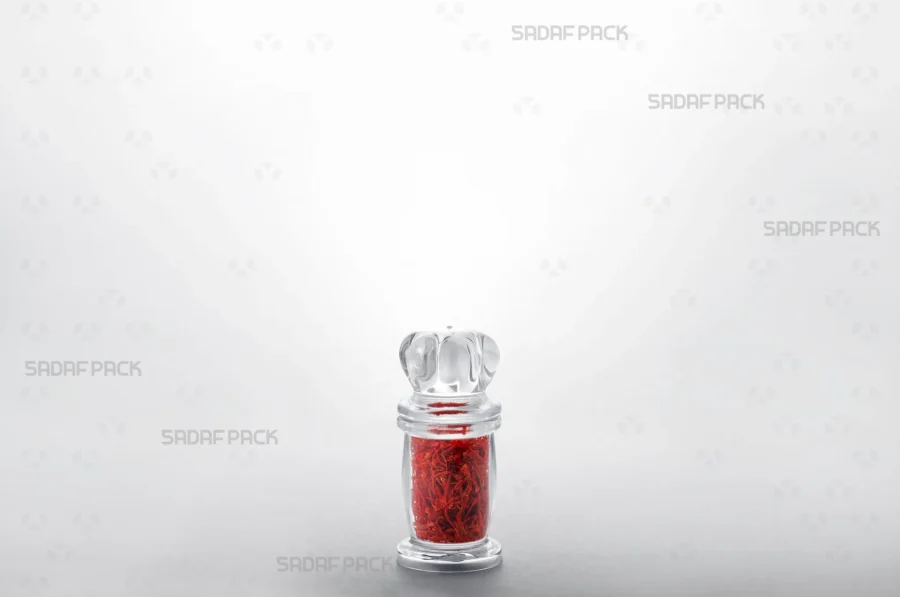 The Milad 1 crystal container filled with high-quality saffron, highlighting its suitability for export-grade products.