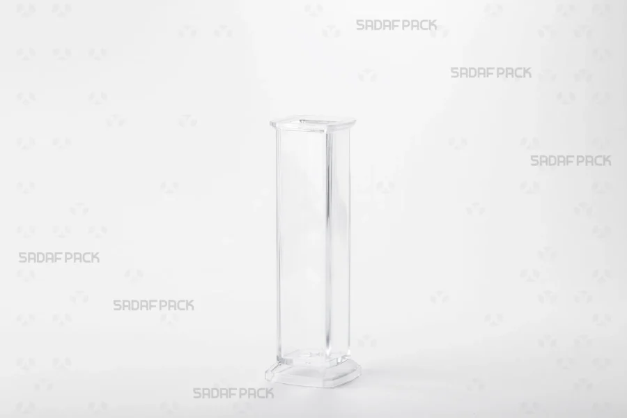 A three-quarter angle view of the Royal container's body, focusing on its durable poly-crystal walls and clear, magnifying structure.