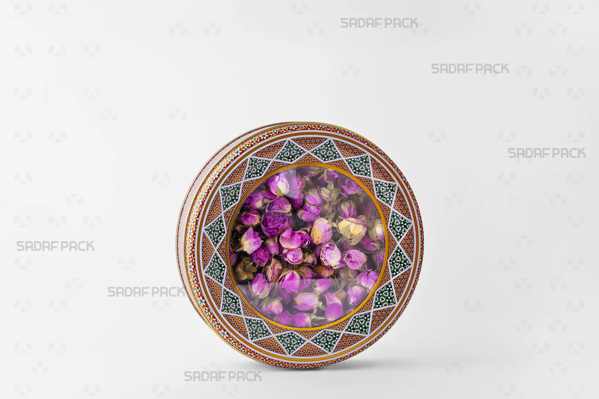 Three-quarter angle view of the 17 cm Metal Tin (3 cm height) filled with dried rosebuds, illustrating its use for packaging premium dried fruits.