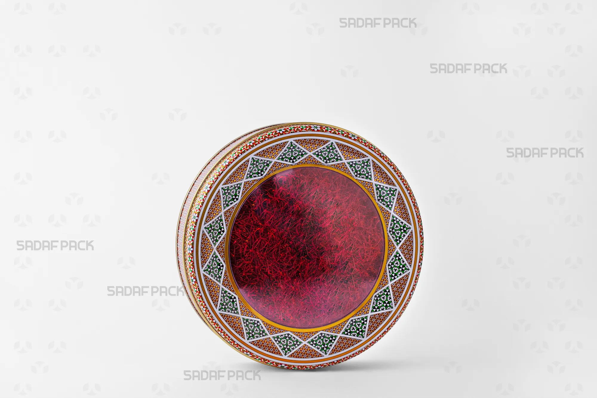 Three-quarter angle view of the 17 cm Metal Tin (3 cm height) filled with saffron, illustrating its use for packaging premium dried fruits.