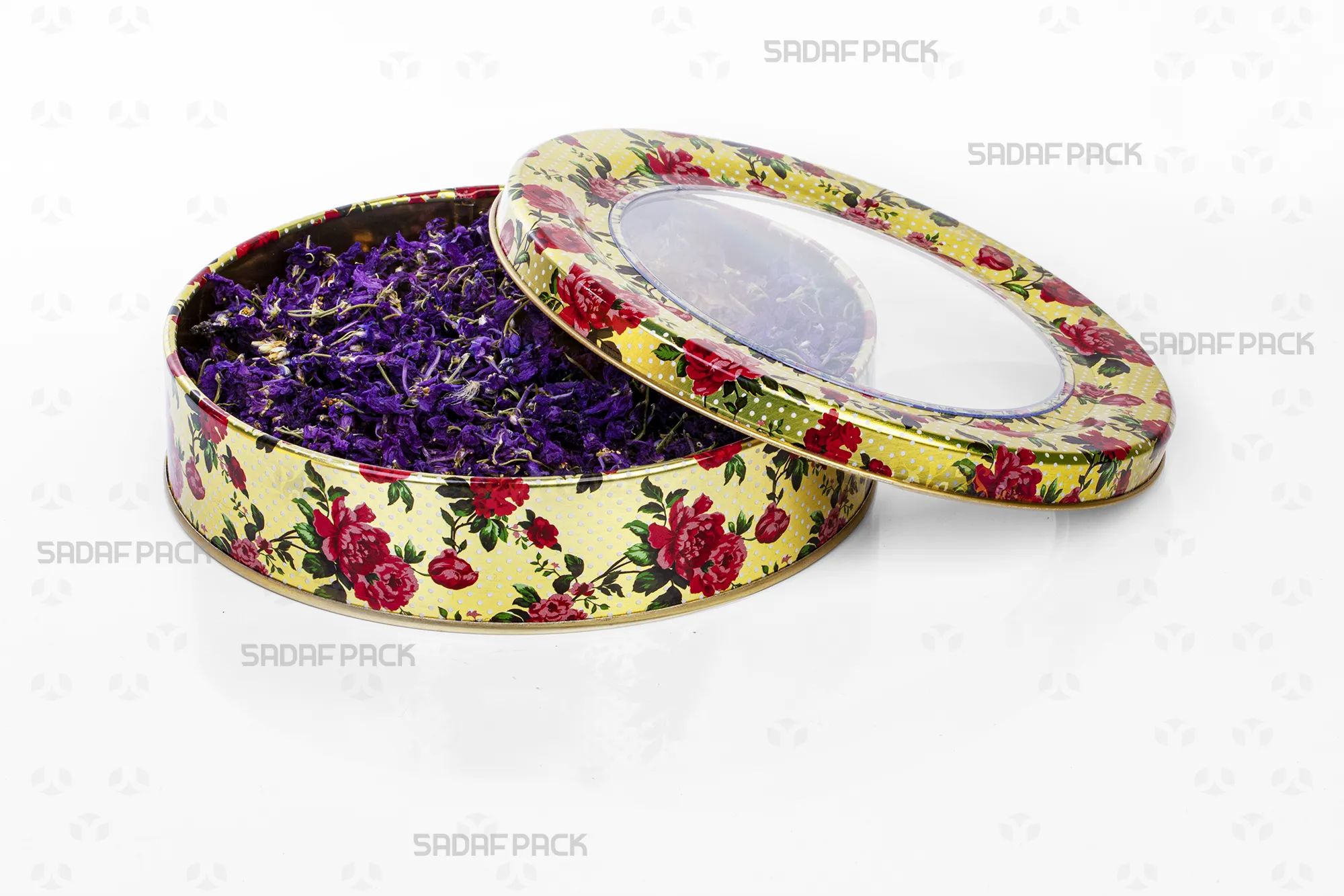 Top-down view of the Sadaf Pack 17cm x 3cm round metal tin, showing the open lid and base with the Rose Gold design, filled with dried borage flowers to display capacity.