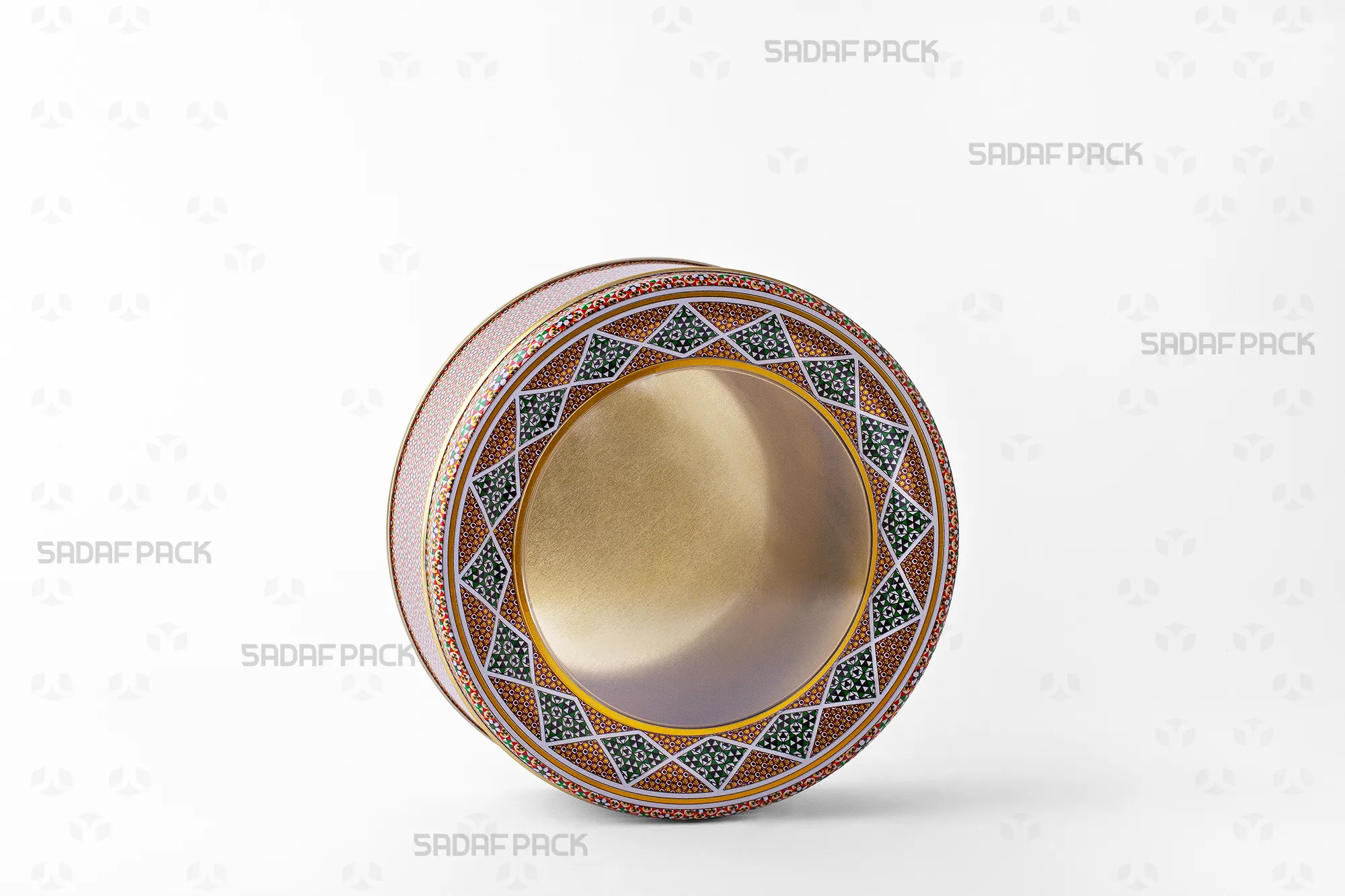 Three-quarter view of the 17 Metal 5 cm circular tin container from Sadaf Pack, showing its metal body and lid option.