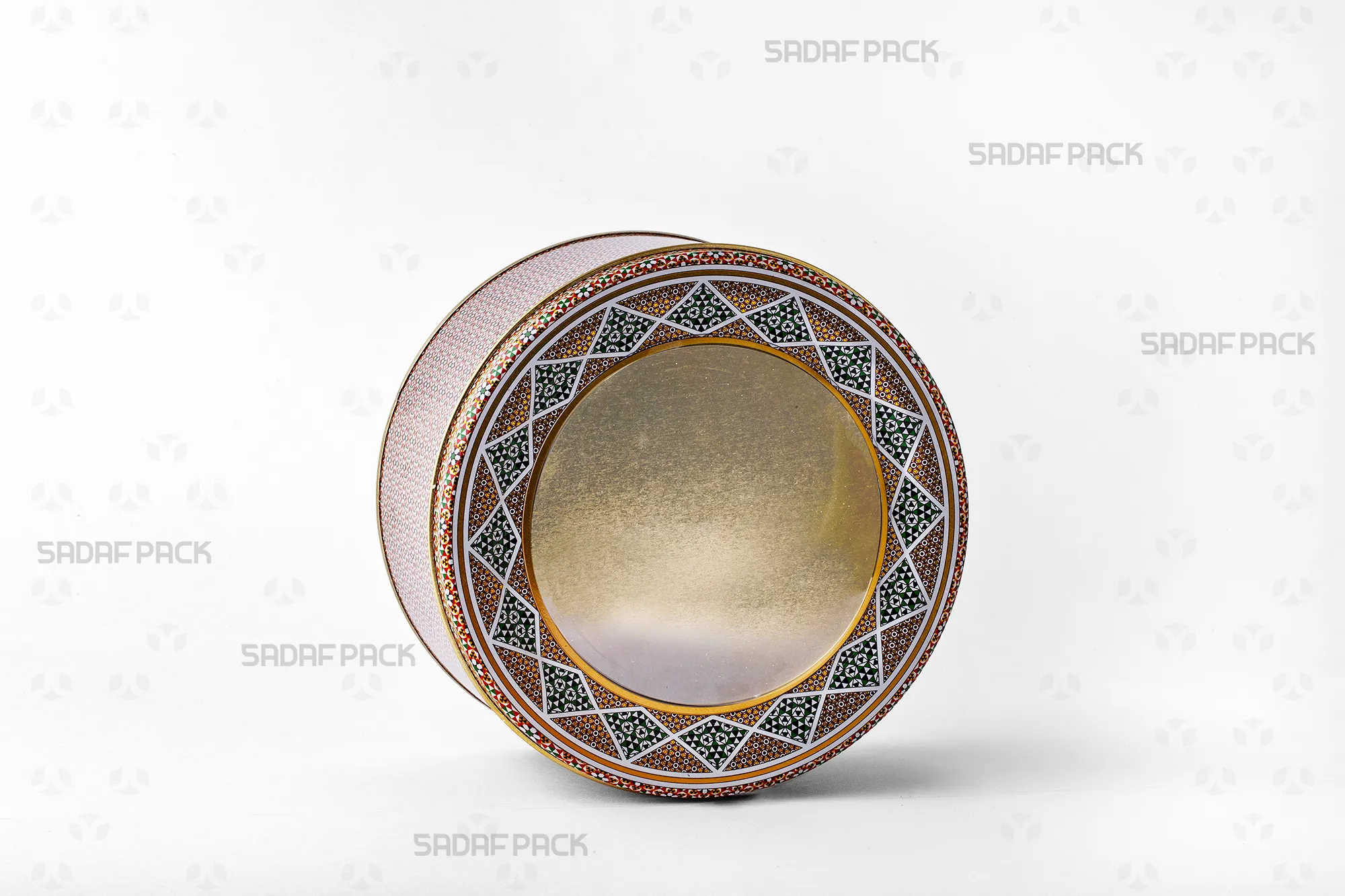 Three-quarter view of the 17 cm Metal Tin with 8 cm depth, featuring a clear polycrystal window lid, by Sadaf Pack.