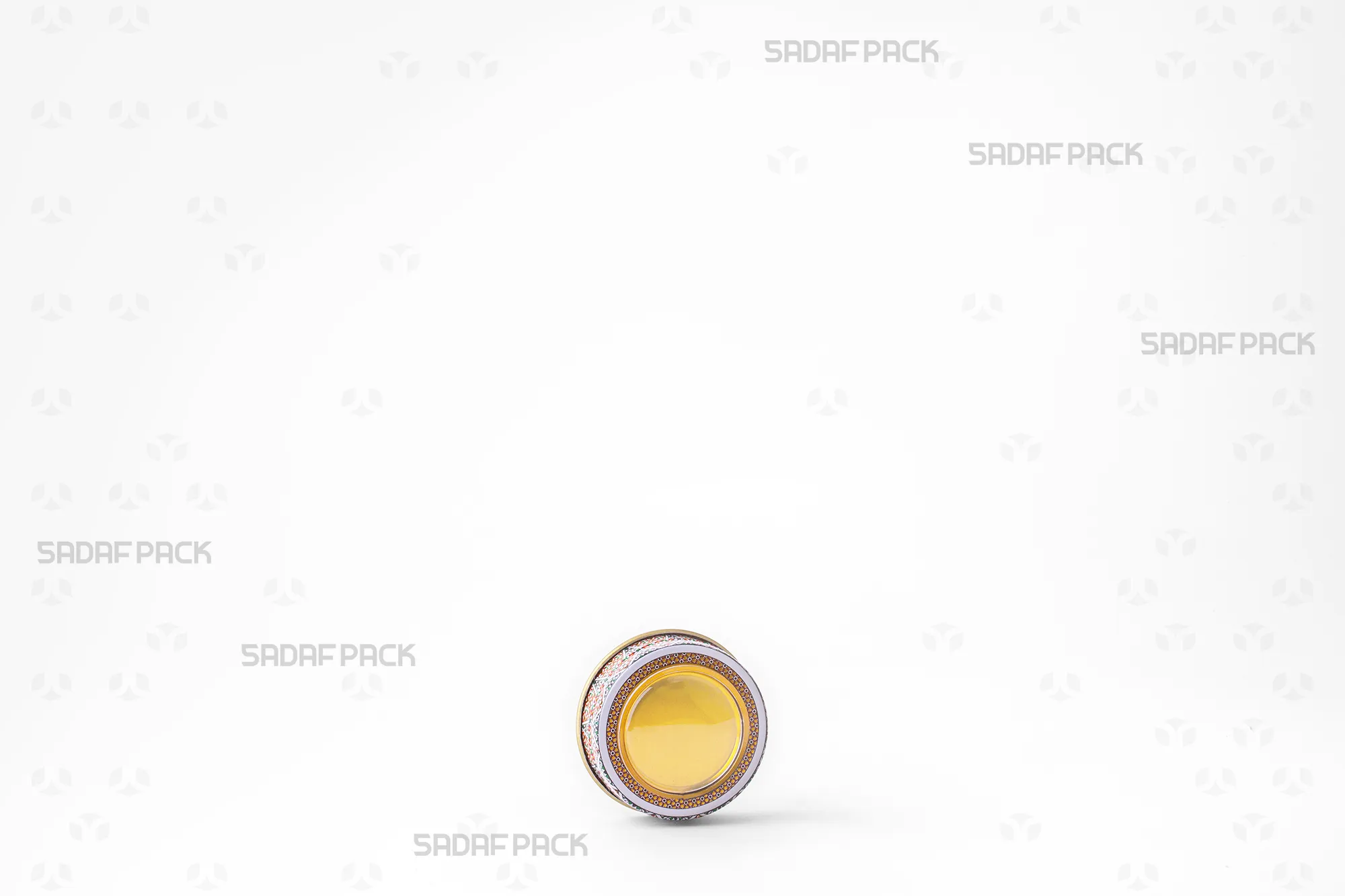 Three-quarter angle view of the 1 gram Metal Tin saffron container by Sadaf Pack.