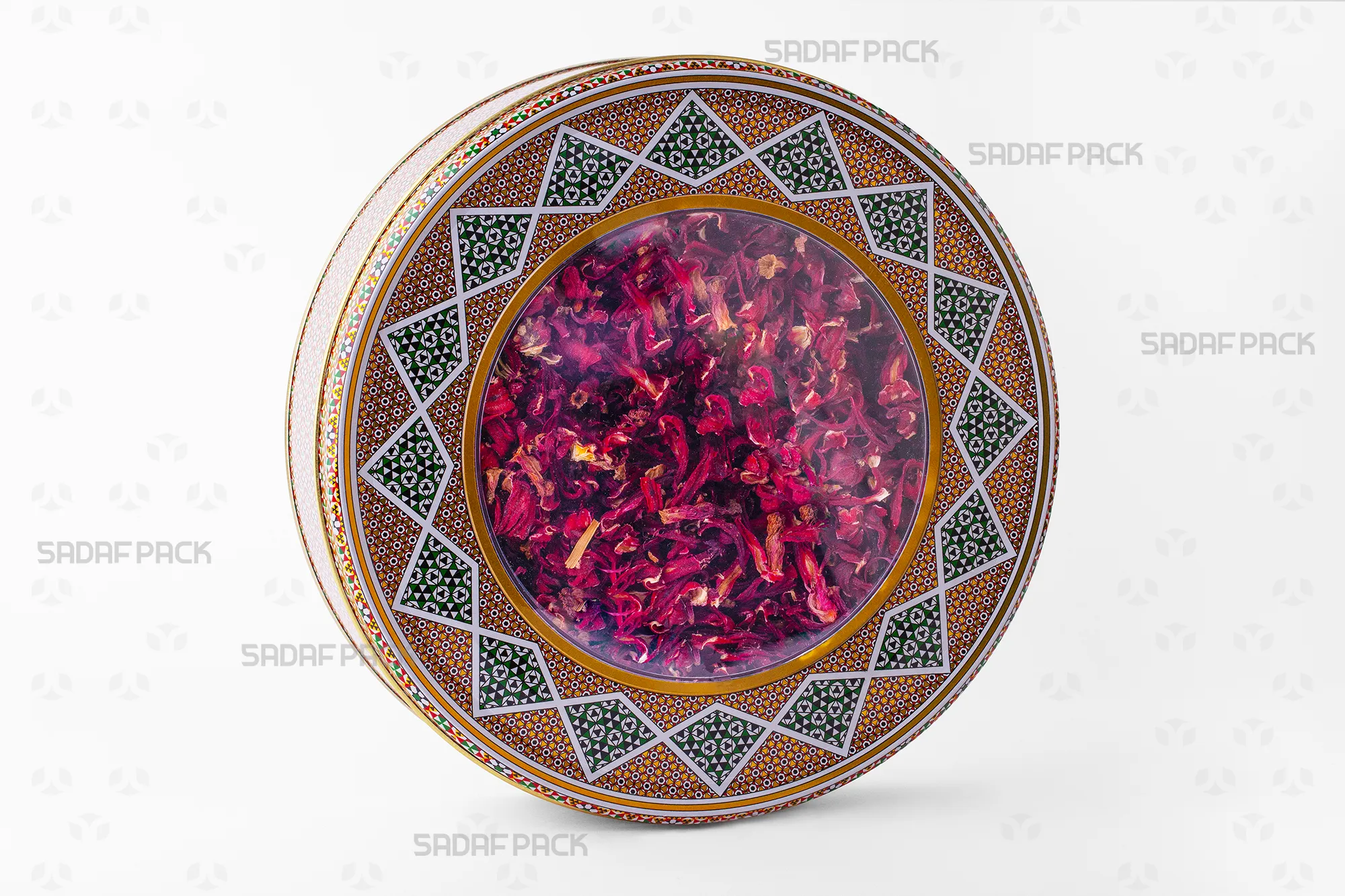 The 23 cm, 4 cm height Sadaf Pack Metal Tin filled with assorted Dried Hibiscus Petals, highlighting its premium presentation for export.