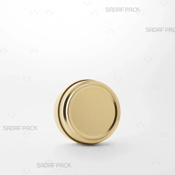 Gold 6.5 Metal 3 cm tin without window (100 Metal) by Sadaf Pack, shown from a three-quarter angle.