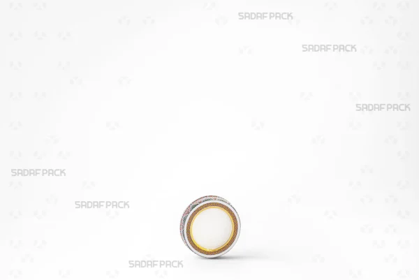 Three-quarter view of the 5 Metal España circular tin for saffron packaging by Sadaf Pack.