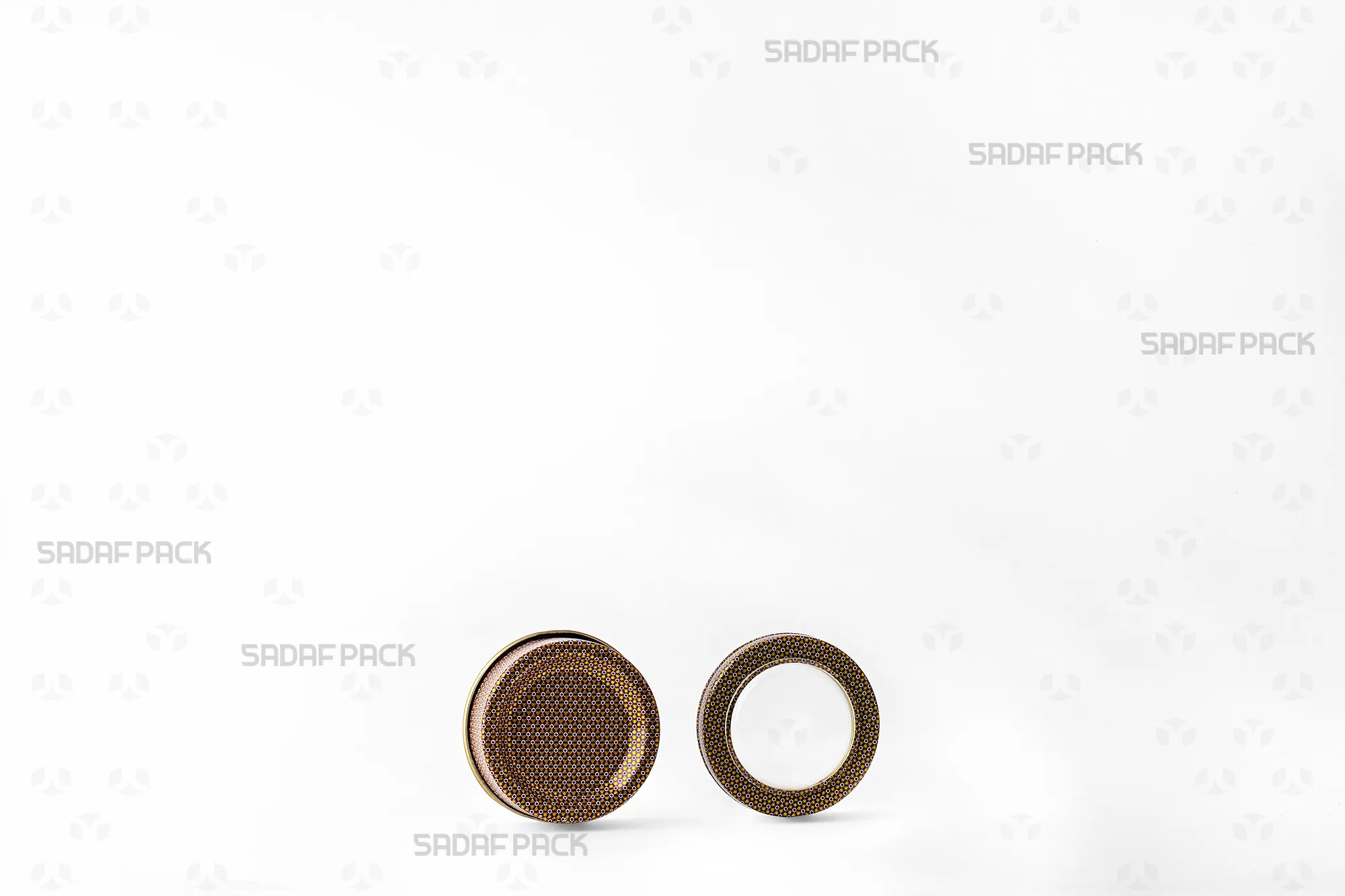 The 1 gram Brown Khatam metal tin shown open with its lid beside the body, displaying the clean metal interior for saffron preservation.