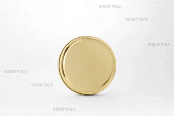 Three-quarter view of the Gold 9 Metal 2 cm Tin without Window (200 Metal) from Sadaf Pack, showcasing its solid gold-colored lid and circular body.