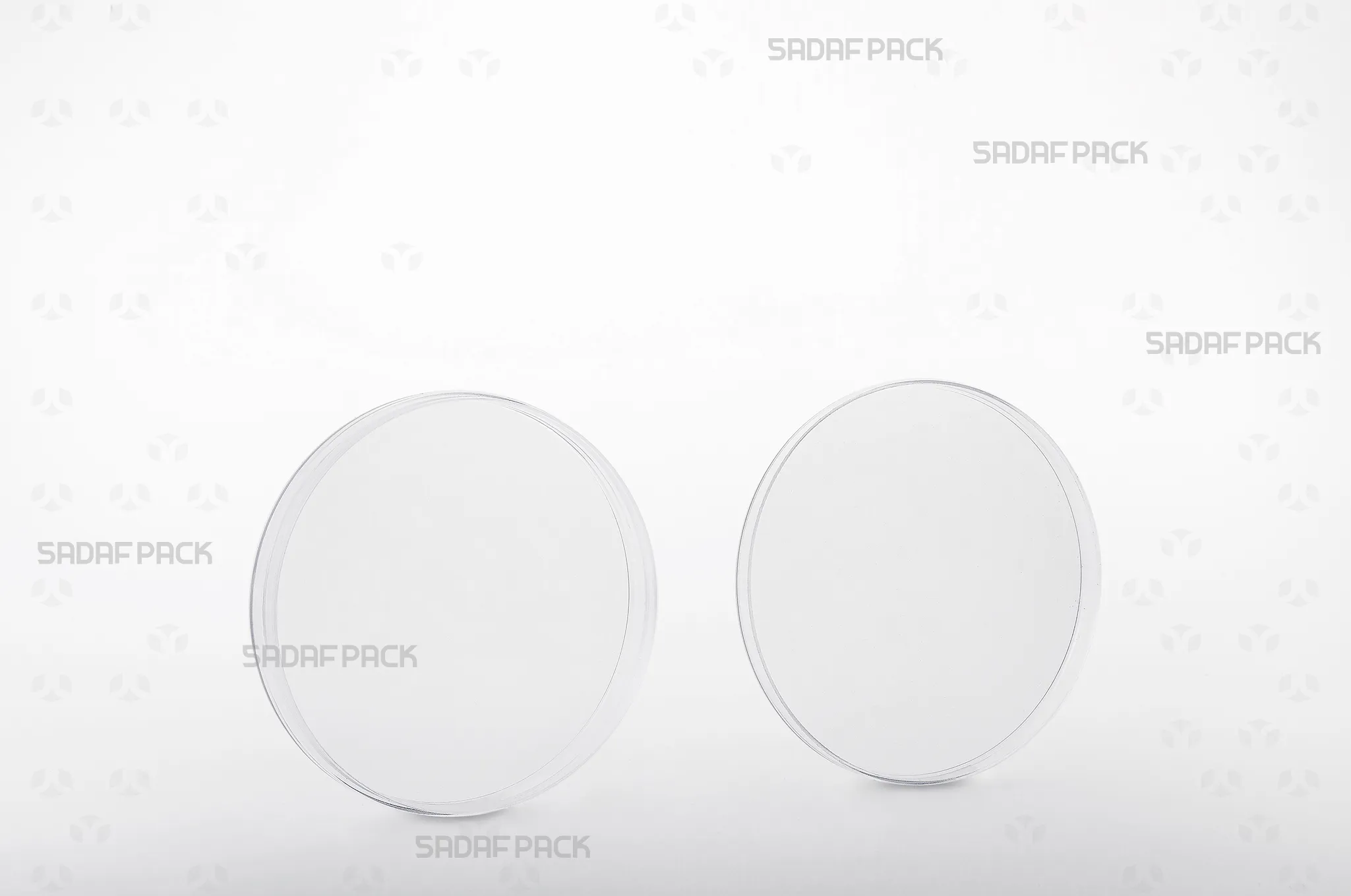 The 10 Core Crystal container shown with its lid placed alongside, revealing the pristine interior space designed for high-value products like saffron.