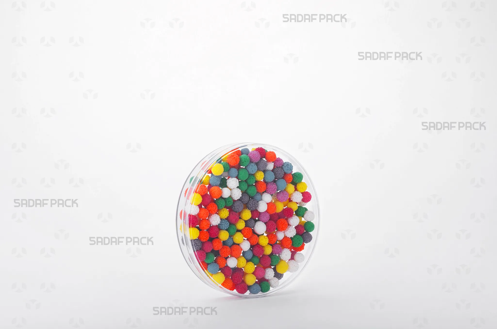 The 10 Core Crystal container filled with premium Sprinkles, showcasing its suitability for luxury export markets.