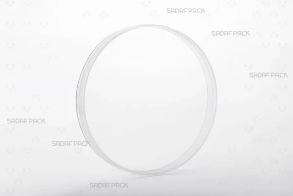 Three-quarter angle view of the 15 Core Crystal container from Sadaf Pack, a large circular container with a deep body designed for premium visibility.