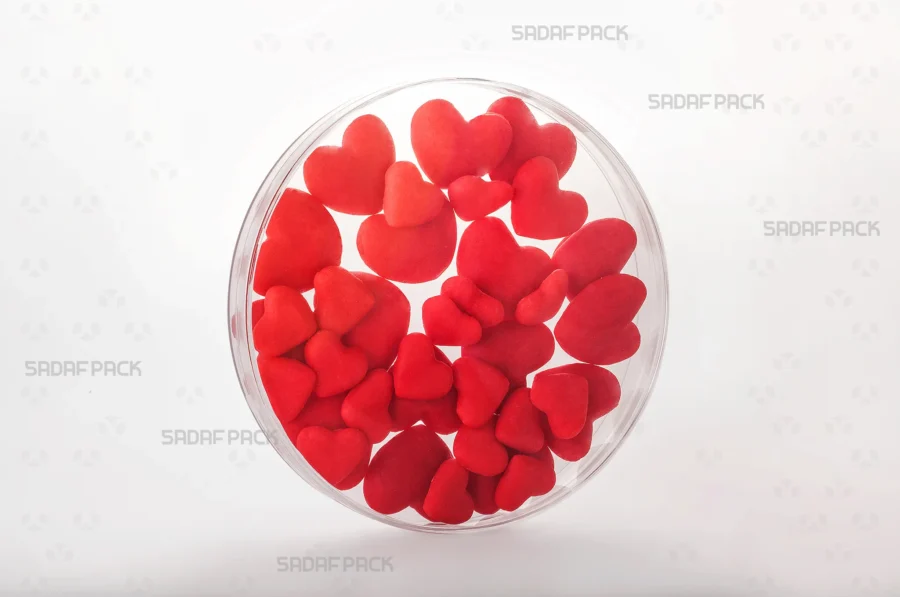 A 15 Core Crystal container filled with red heart candy, showcasing its generous capacity and its suitability for high-end retail and export packaging.