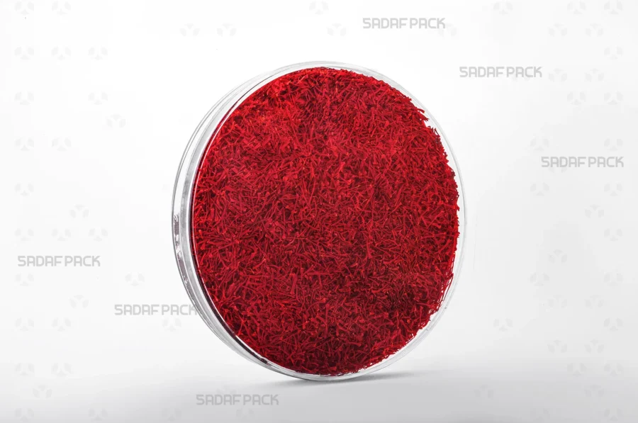 A 15 Core Crystal container filled with saffron, showcasing its generous capacity and its suitability for high-end retail and export packaging.