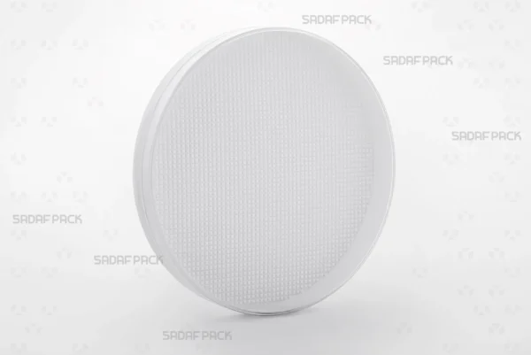 A three-quarter angle view of the 15 Core España tin container by Sadaf Pack, designed for premium saffron and spice packaging.