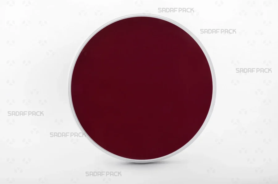 A 15 Core España tin filled with size 15 crimson Cardboard Pad