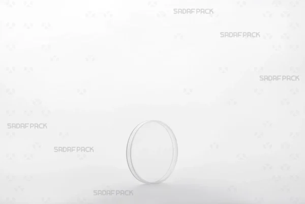 عبوة 5 من طراز الكريستال العميق من صدف باك، وهي عبوة دائرية فاخرة مصممة للزعفران عالي القيمة، معروضة من زاوية ثلاثة أرباع.