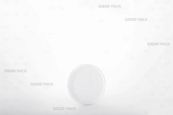 A three-quarter angle view of the 6.5 Slim España round poly-crystal container by Sadaf Pack, designed for premium saffron packaging.