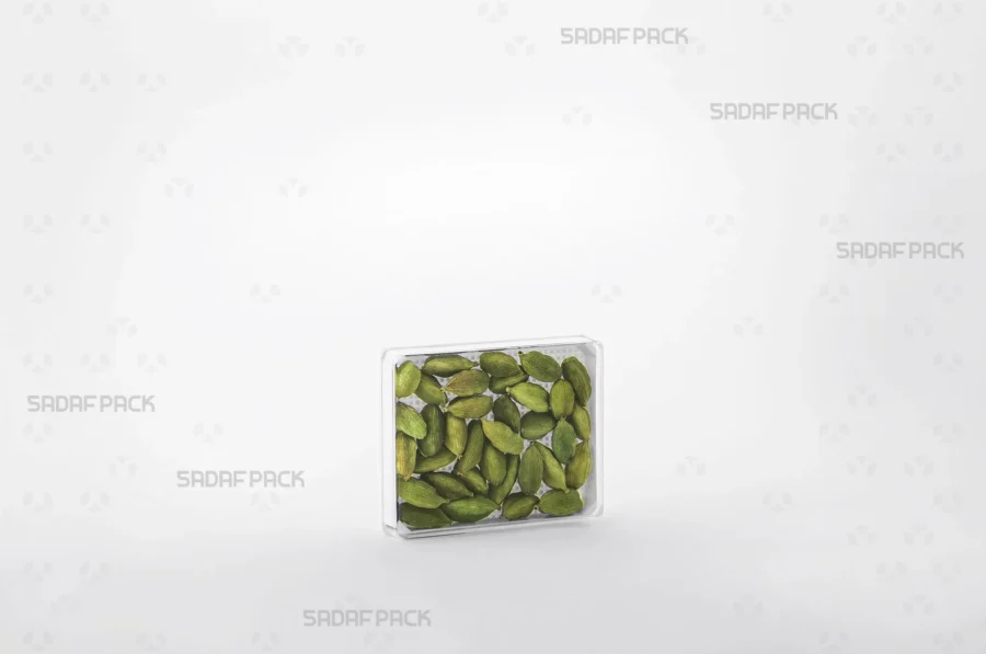 The 7 España Rectangle container filled with cardamom, demonstrating its ideal capacity for high-value, export-quality products.