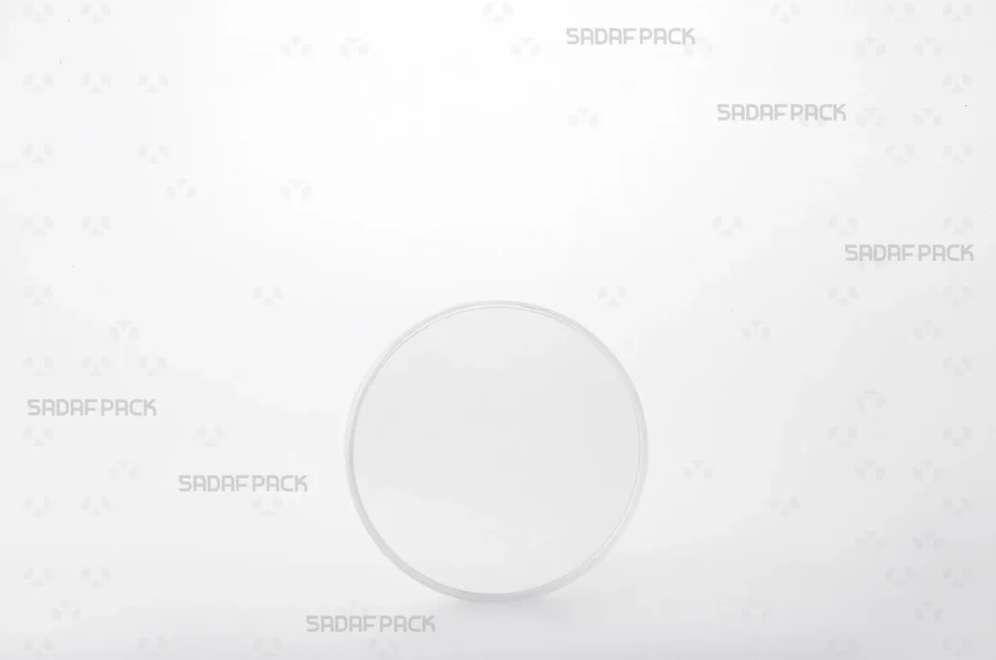 Front angle view of the 9.5 Core Crystal Container, showcasing its circular shape, 9.5 cm diameter, and the depth provided by the 'core' design.