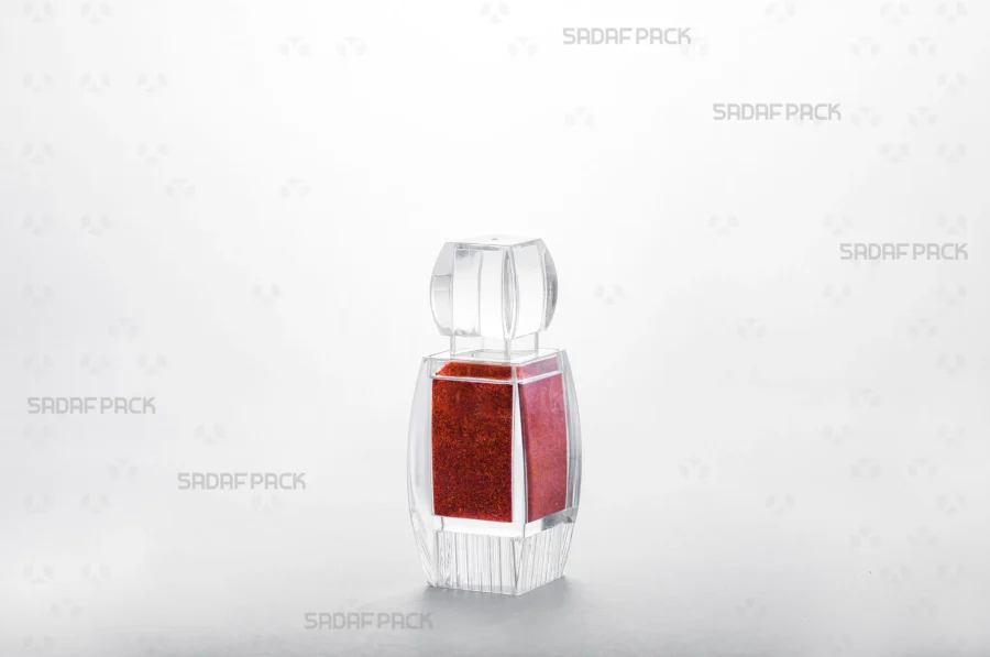 An Azin 2 Raised Bottom container filled with red chili powder, showcasing its suitability as an elegant and protective export packaging solution.