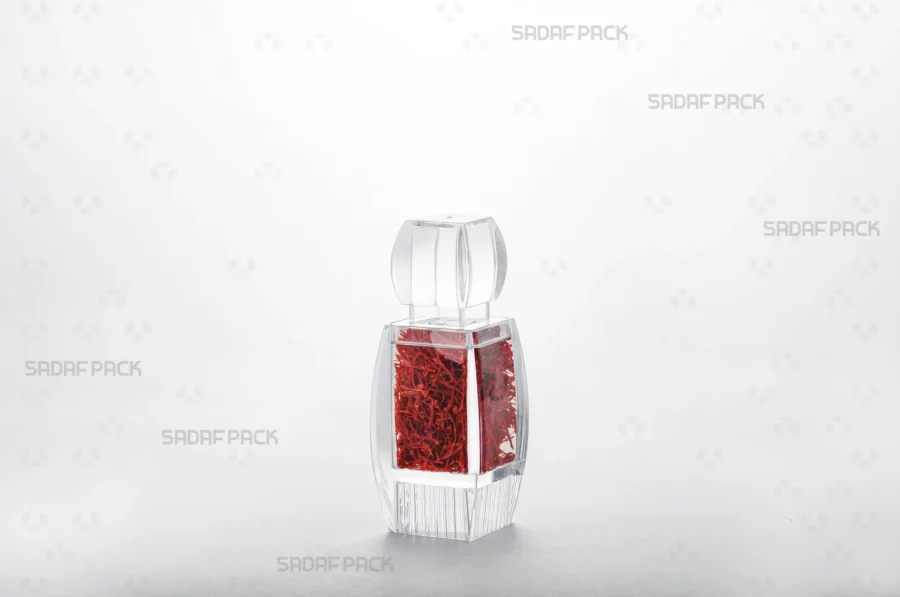 An Azin 2 Raised Bottom container filled with red saffron, showcasing its suitability as an elegant and protective export packaging solution.