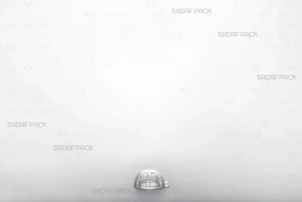 A three-quarter view of the Cheshmi Small crystal container by Sadaf Pack, designed for premium saffron packaging.