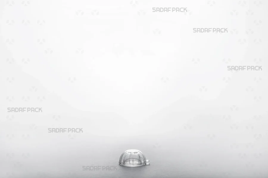 A three-quarter view of the Cheshmi Small crystal container by Sadaf Pack, designed for premium saffron packaging.