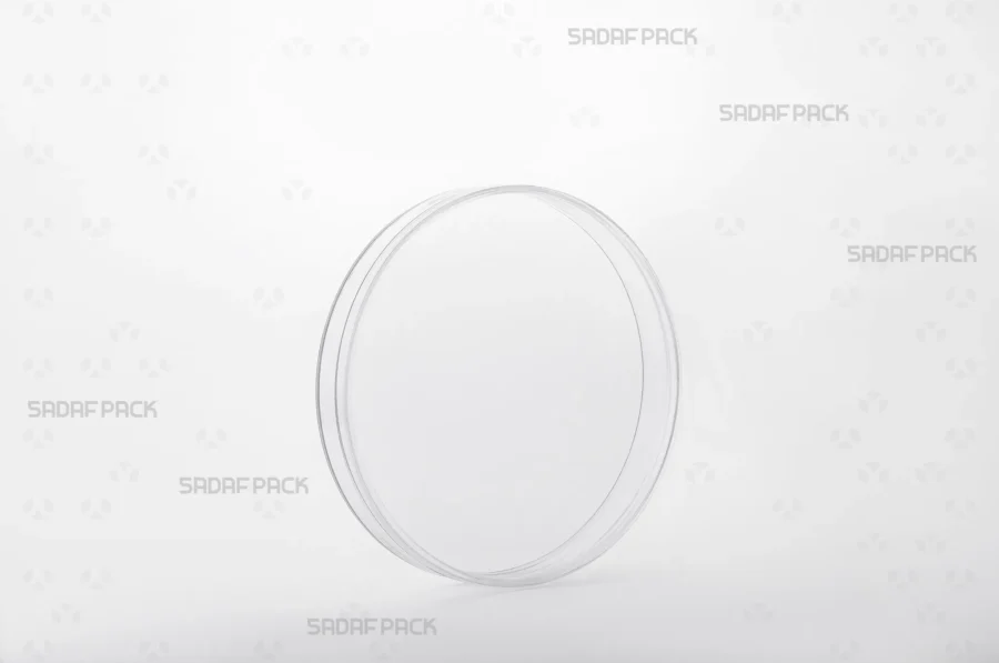 A three-quarter angle view of the 12 Core Crystal Container from Sadaf Pack, showcasing its circular design and transparent lid.
