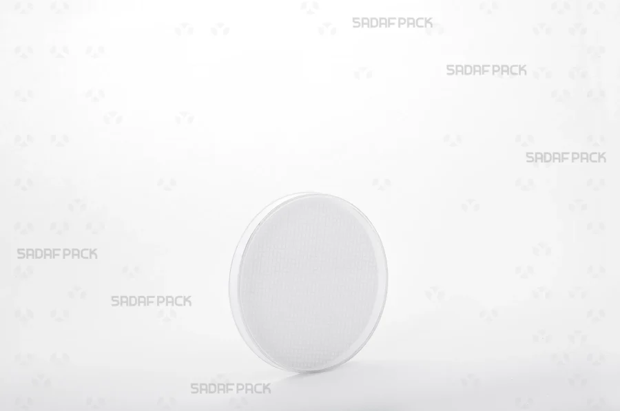 A three-quarter view of the 7.5 España circular polycrystal container from Sadaf Pack, showcasing its transparent design.