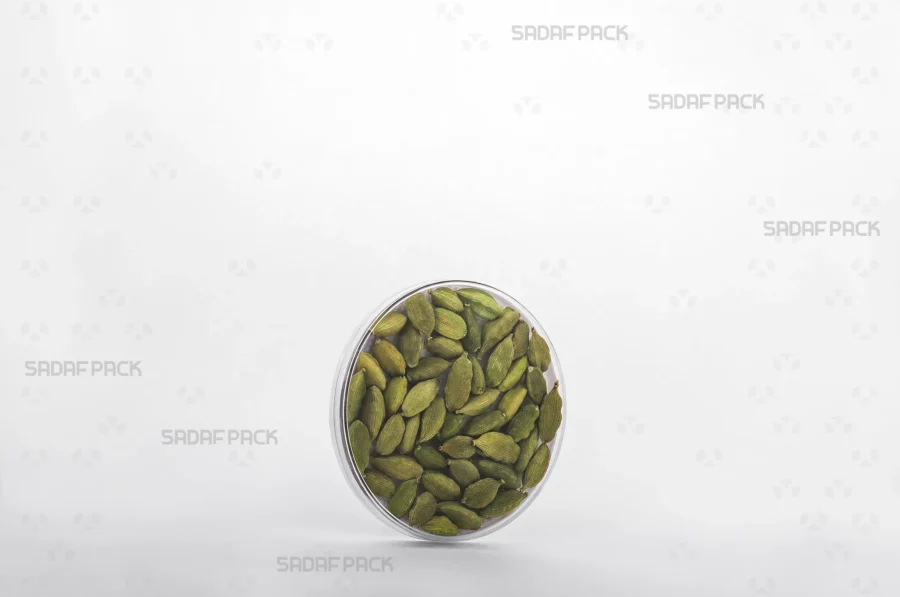 The 7.5 España container elegantly filled with high-quality cardamom, demonstrating its ideal use for export packaging.