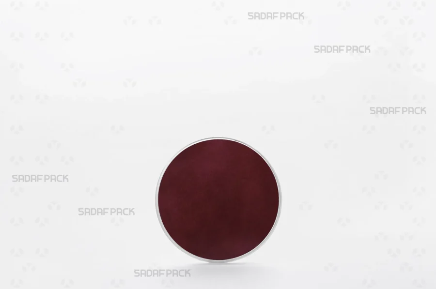 Three-quarter angle view of the 7.5 España round poly-crystal container with crimson Cardboard Pad 7.5 inside container