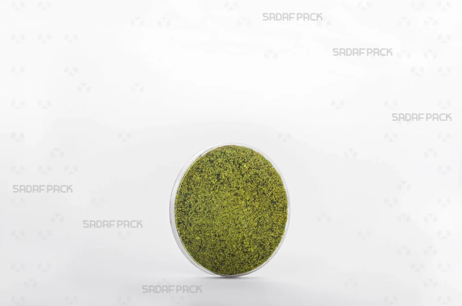 The 7.5 España container elegantly filled with high-quality pistachio powder, demonstrating its ideal use for export packaging.