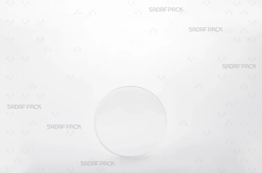 Front angle view of the 7.5 Slim Crystal container, highlighting its slim circular structure and transparent poly-crystal material.