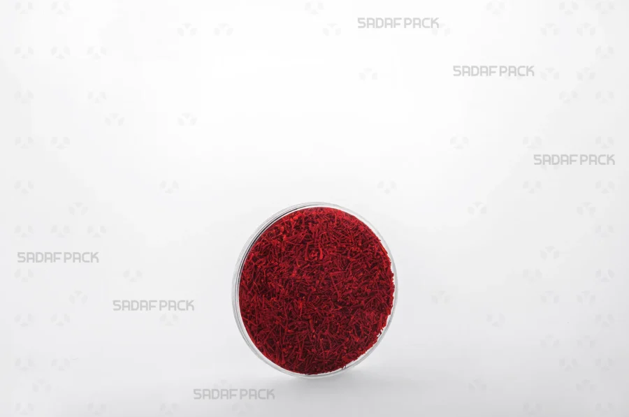 Three-quarter view of the 7.5 Slim Crystal container filled with high-quality saffron, showcasing its suitability for export products.