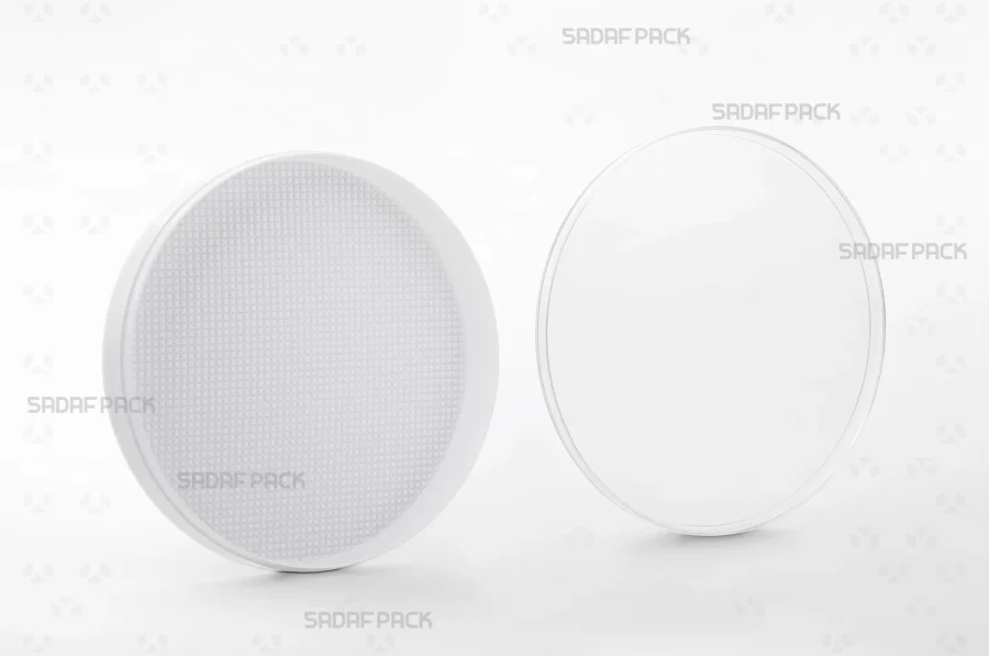 The 12 Core España container shown with its lid and body separated side-by-side, revealing the spacious, polished interior ideal for protecting delicate contents.