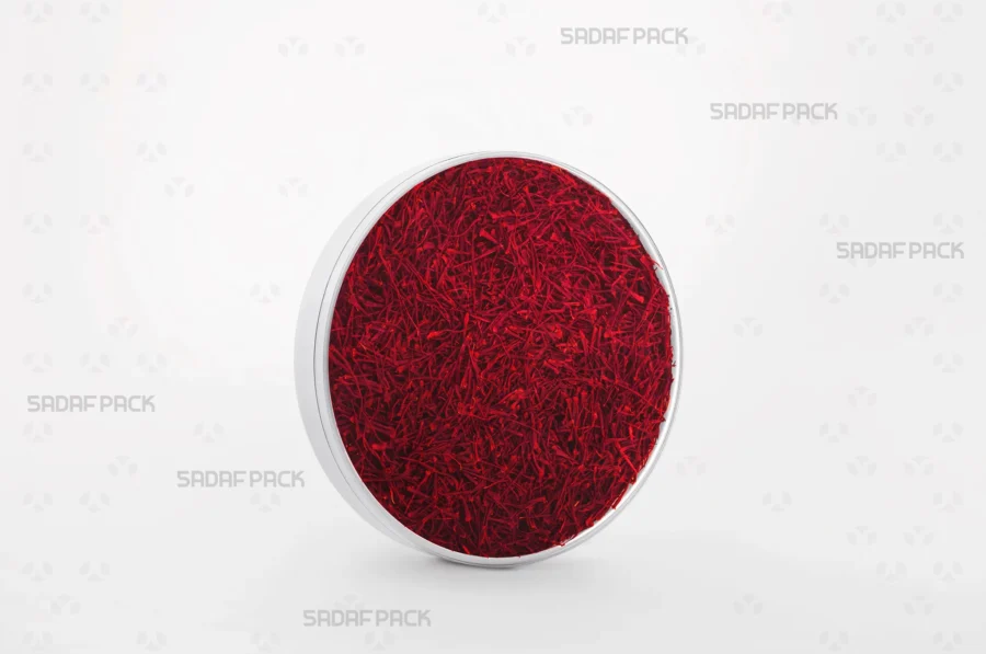 A 12 Core España container filled with high-quality saffron, demonstrating its suitability for export-grade saffron and spices.