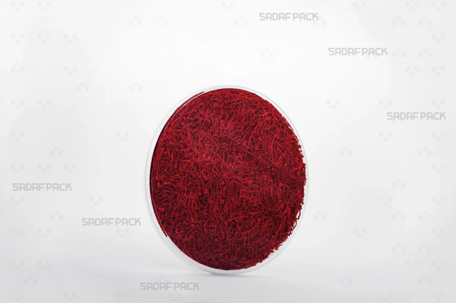 A three-quarter view of the 12 Medium España container filled with saffron, highlighting its suitability for export-quality saffron. 