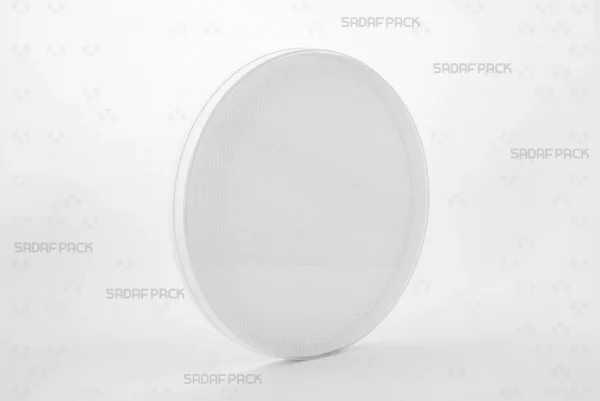 A three-quarter angle view of the 15 Medium España round crystal container by Sadaf Pack, designed for premium saffron packaging.