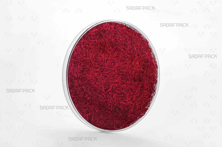A three-quarter angle view of the 15 Medium España container filled with saffron, showcasing its suitability for high-value export products. 