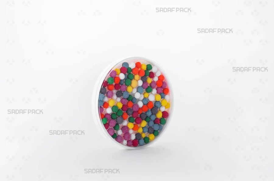 Three-quarter angle view of the 9 España container filled with Sugar Pearl, showcasing its suitability for luxury food exports.