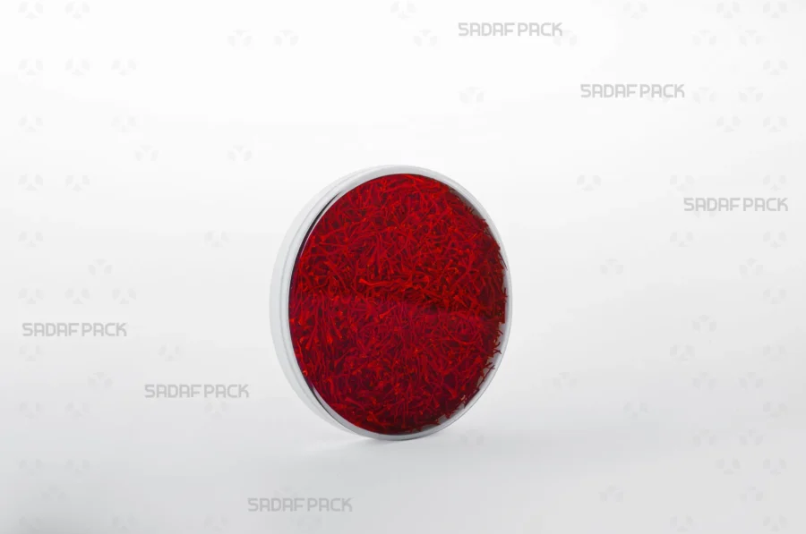 Three-quarter angle view of the 9 España container filled with saffron, showcasing its suitability for luxury food exports.