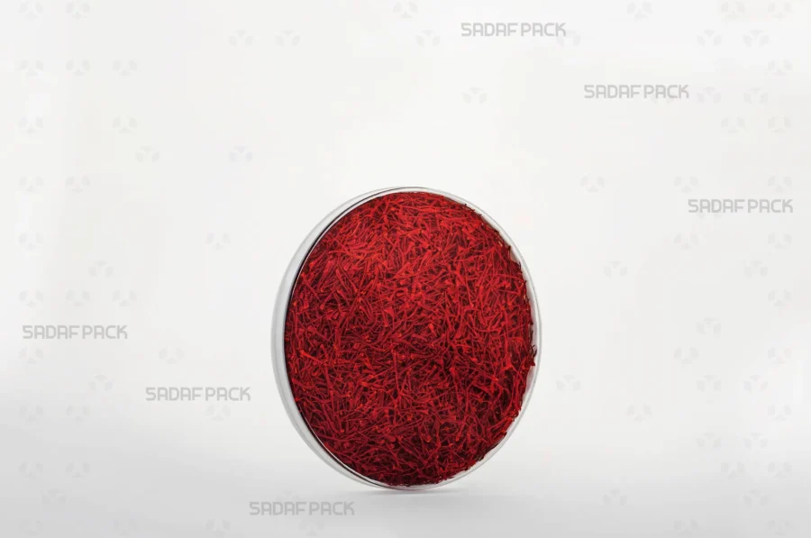 The 9.5 España container filled with high-quality saffron, demonstrating its use for premium export packaging. 