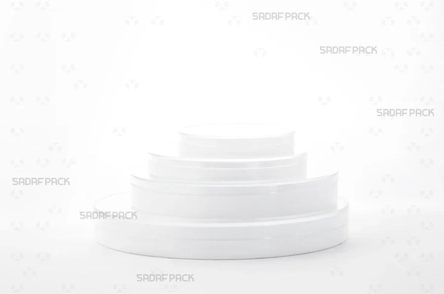 A collection of various sizes from the España crystal container series, showcasing the cohesive product line from Sadaf Pack for diverse packaging needs.