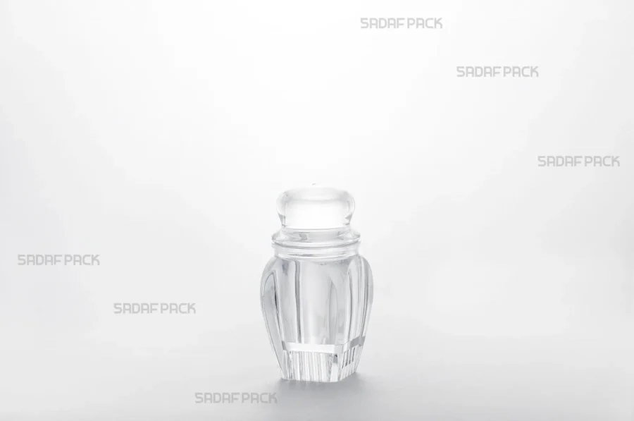 A three-quarter angle view of the Gohar 2 Raised Bottom crystal container by Sadaf Pack.