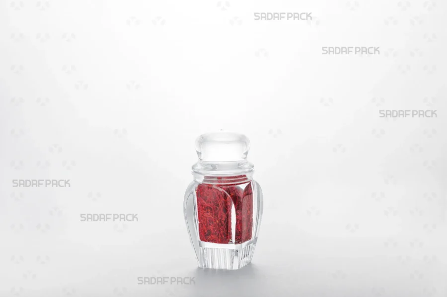 A three-quarter angle view of the Gohar 2 Raised Bottom container filled with saffron, showcasing its suitability for luxury export packaging. 