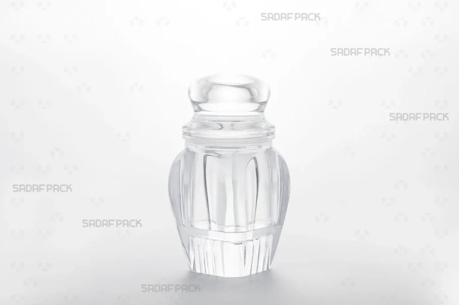 A three-quarter angle view of the Gohar 4 Raised Bottom crystal container by Sadaf Pack, showcasing its elegant design for premium saffron packaging.