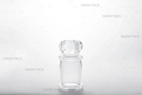 A three-quarter angle view of the elegant Milad 2 Crystal Container by Sadaf Pack, showcasing its seamless design.