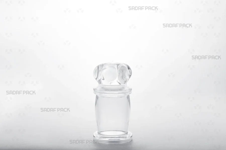 A three-quarter angle view of the elegant Milad 2 Crystal Container by Sadaf Pack, showcasing its seamless design.